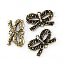 Конектор-Сеттінг Бантик, під Стрази, 2 отвори, Біжутерний сплав, Колір: Бронза, Розмір: 14.5х23х3.5мм, Отвір 2мм, Придатний під Стрази 1~2мм. (2WB29334)