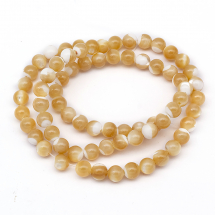 Koraliki Muszle Morskie Okrągłe Kolor: Jasny Łosoś 6mm Otwór 1mm 68szt/37cm/nić (13WB27755)