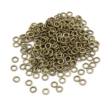 Kółeczka Ogniwka Pojedyncze Otwarte Żelazo 5x1mm Kolor: Bronze około 590szt/50g (13WB26999)