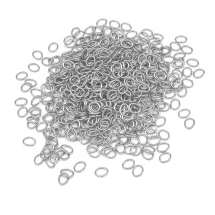 Kółeczka Ogniwka Pojedyncze Otwarte Żelazo Owalne Kolor: Platyna 5.5x4.3x0.7mm około 1200szt/50g (13WB27015)